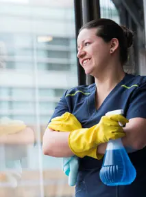 Woman cleaning windows.